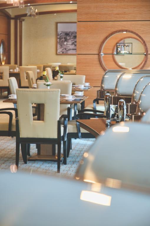 Wiseman Grand Hotel Doha Exterior photo The interior of the restaurant